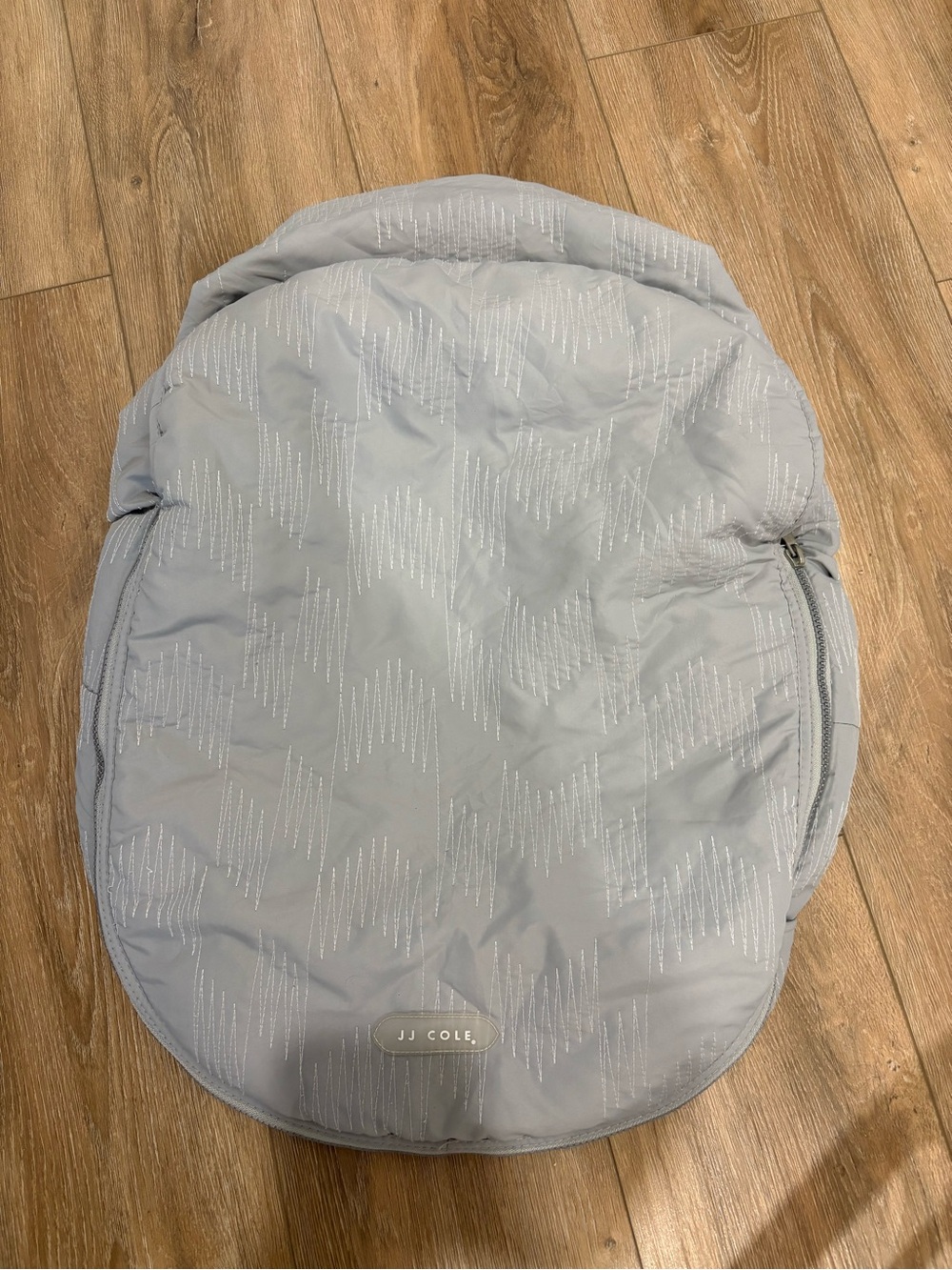 JJ Cole Light Gray Infant car seat cover - Pale Gray with Subtle Pattern